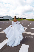 Load image into Gallery viewer, Strapless Ruched Bodice Ball Gowns 2080 Organza Wedding Dress with Detachable Long Sleeves Empire Bridal Gowns
