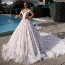 Load image into Gallery viewer, Traugel Off The Shoulder A Line Lace Wedding Dresses Elegant Appliques Lace Up Bride Dress Cathedral Train Bridal Gown Plus Size